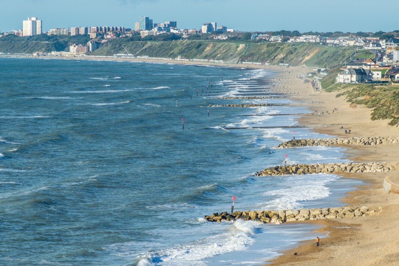 The coastline at Southbourne with beach, groynes and cliffs.